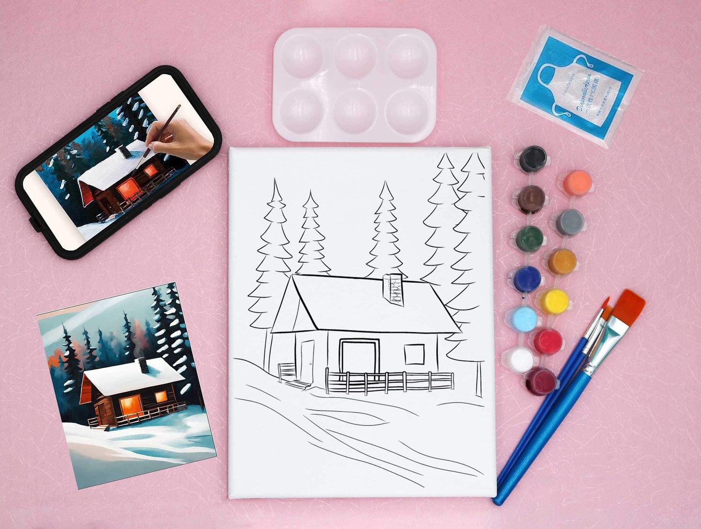 pre-drawn canvas kit with video, acrylic paints, art palette and reference card, featuring snow and a cabin in a mountain