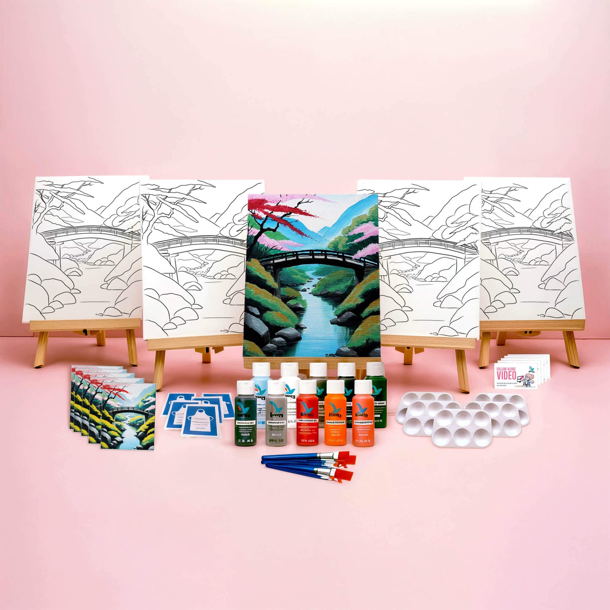 Paint Party Bundle showing all included items: five pre-drawn 8x10 canvases, five wooden easels, five reference cards, five video access cards, paint palettes, brushes, aprons, and paints.