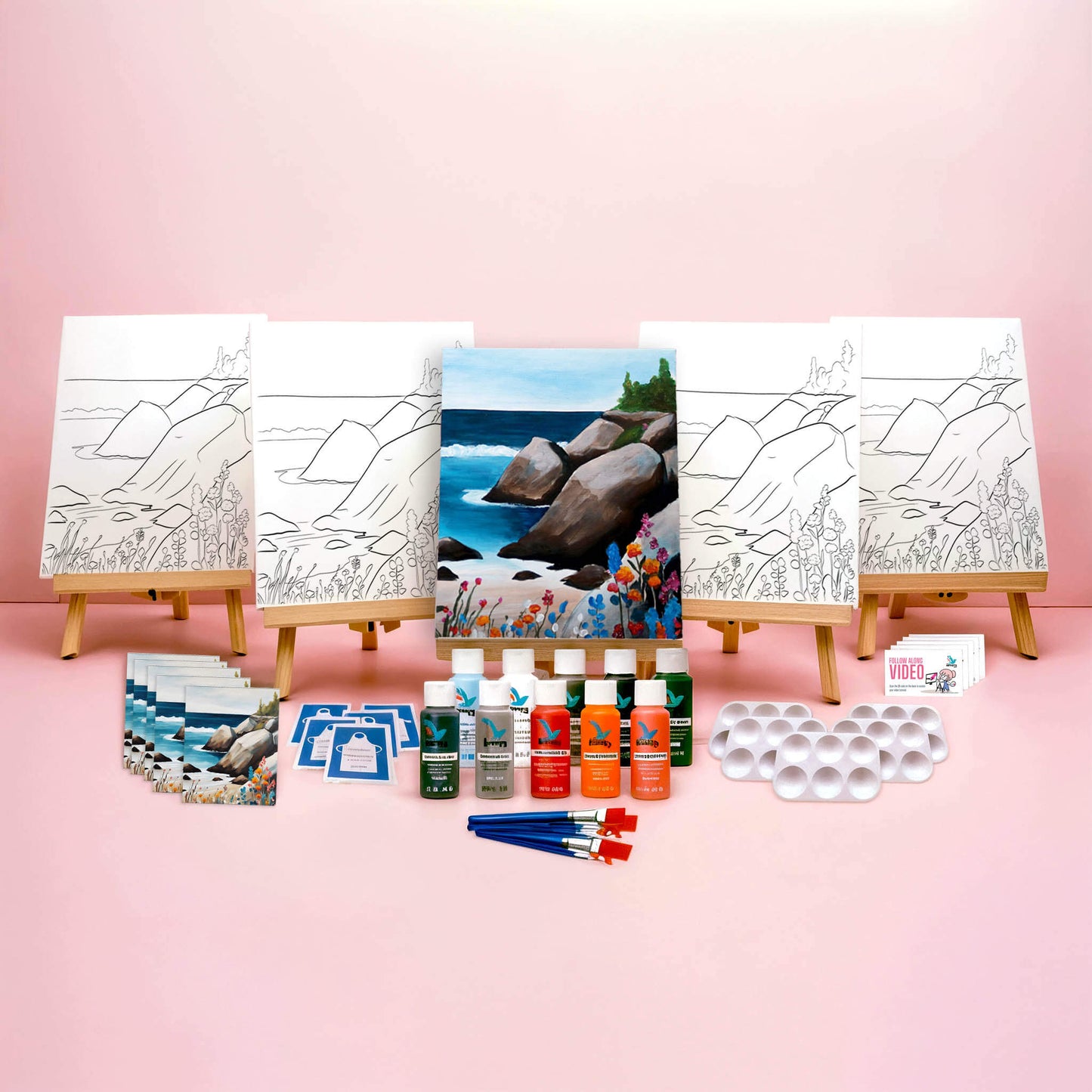 Paint Party Bundle showing all included items: five pre-drawn 8x10 canvases, five wooden easels, five reference cards, five video access cards, paint palettes, brushes, aprons, and paints.