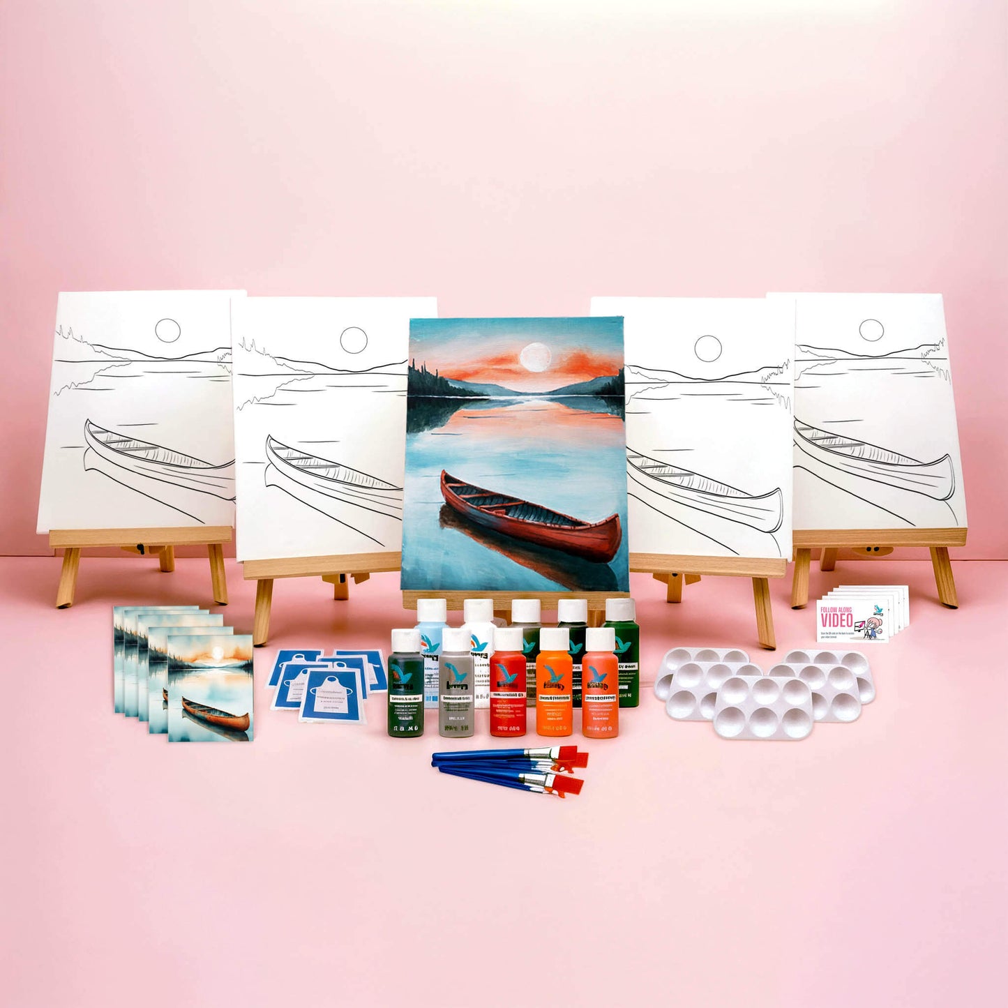 Paint Party Bundle showing all included items: five pre-drawn 8x10 canvases, five wooden easels, five reference cards, five video access cards, paint palettes, brushes, aprons, and paints.