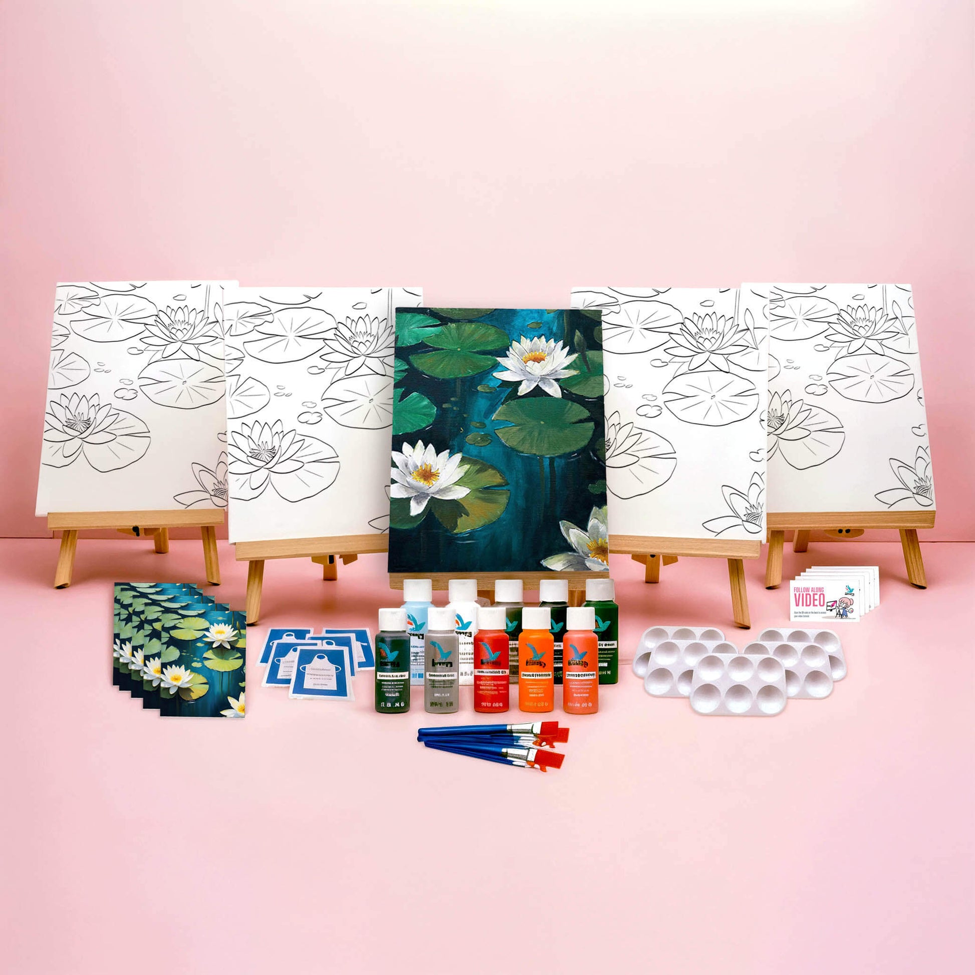 Paint Party Bundle showing all included items: five pre-drawn 8x10 canvases, five wooden easels, five reference cards, five video access cards, paint palettes, brushes, aprons, and paints.