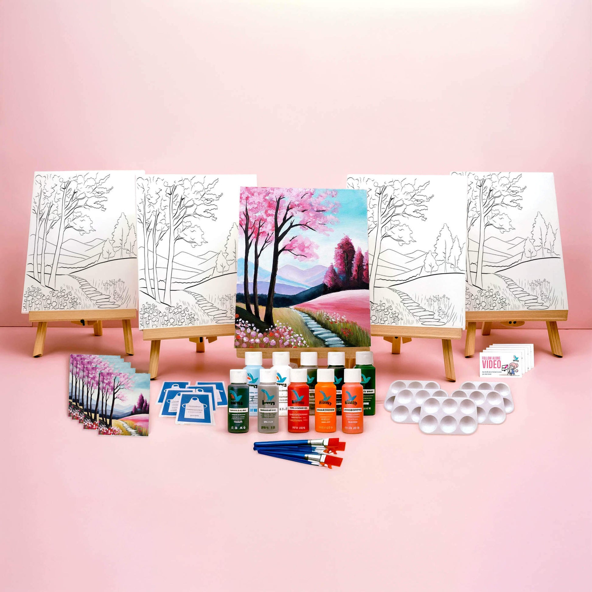 Paint Party Bundle showing all included items: five pre-drawn 8x10 canvases, five wooden easels, five reference cards, five video access cards, paint palettes, brushes, aprons, and paints.