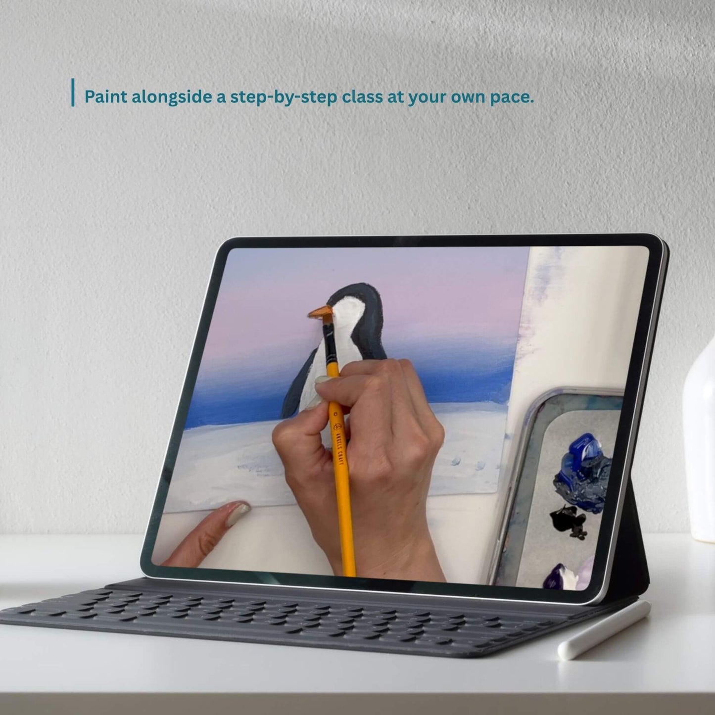follow along video of a winter penguin painting